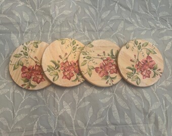 Set di quattro sottobicchieri in legno per decoupage