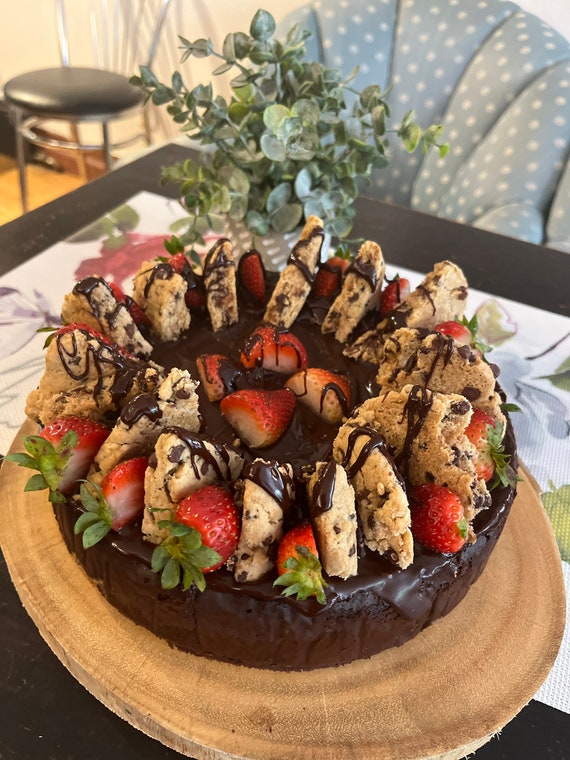 Vegan Gluten Free Chocolate Vanilla chocolate strawberry  cheesecake  with vegan gluten free chocolate chip cookies on the top 8"