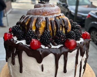 Vegan chocolate vanilla Black Forest cherry cake with vegan cinnamon roll on the top 8'