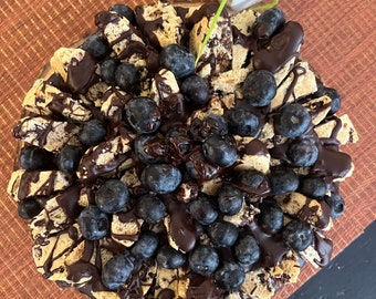 Vegan special edition vanilla blueberry chocolate cake with chocolate chip cookies and fresh blueberries on the top    8”!