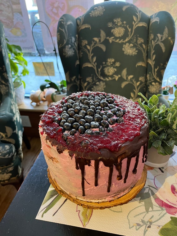 Vegan  double chocolate vanilla cream blueberry  cake  with fresh blueberries on the top 8”!