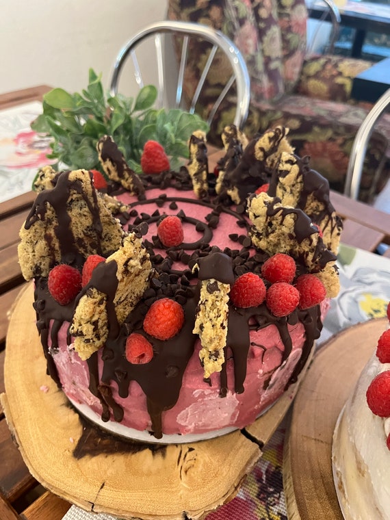 Vegan chocolate vanilla pink raspberry cake with chocolate chip cookies on the top 8'