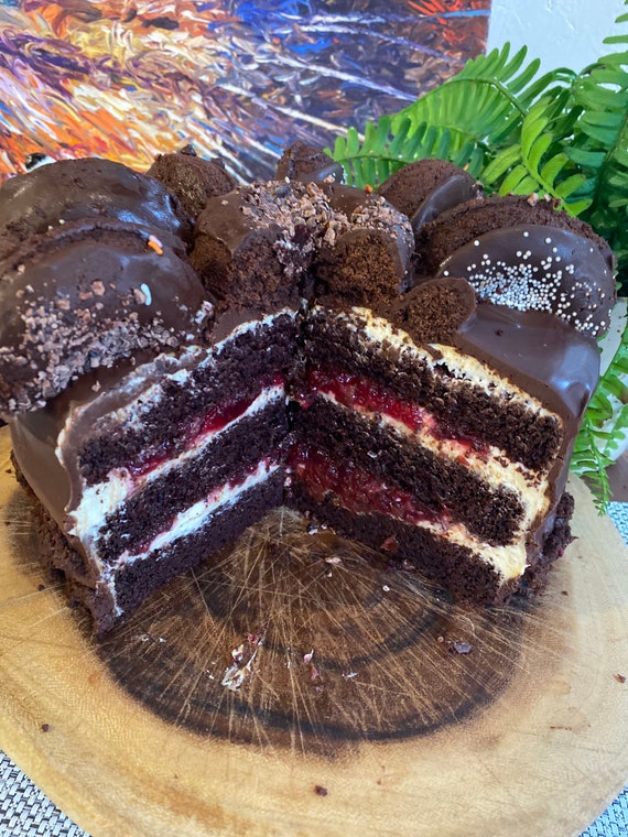 Vegan Chocolate Black Forest cherry vanilla    cake with chocolate  donuts on the top  8'' !