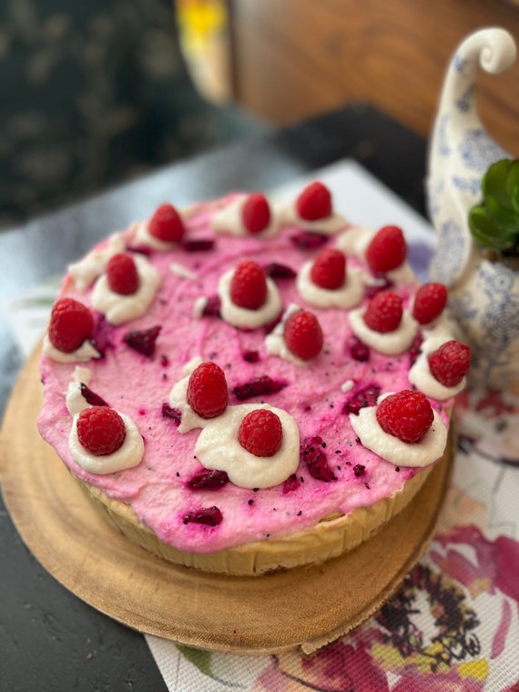 Vegan Gluten Free Vanilla Pink Raspberry cheesecake with fresh raspberries 8"