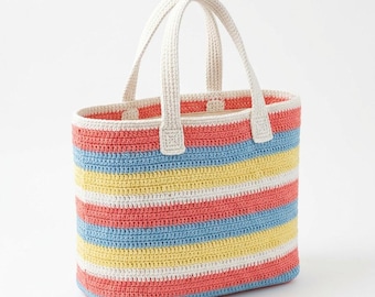 Puede incluir: Un bolso tote rectangular de ganchillo con rayas horizontales en coral, azul claro, amarillo y blanco. El bolso cuenta con dos asas de ganchillo blancas y resistentes unidas al borde superior, lo que le da una forma estructurada a este accesorio.