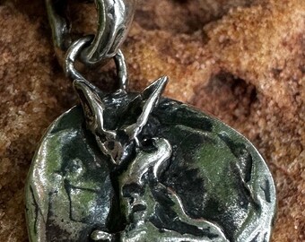 Garden rabbit..Sterling Silver slide designer hand cast rabbit on 17” sterling charm and brass/silver chain.