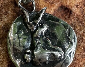 Garden rabbit..Sterling Silver slide designer hand cast rabbit on 17” sterling charm and brass/silver chain.