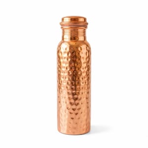 Garrafa de água artesanal em cobre puro com design martelado.