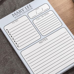 May include: A white rectangular notepad with black text and lines. The header reads MARY LEE SCHOOL COUNSELOR. It features sections labelled TO DO with bullet points, CALL OR EMAIL with lines, a date field, and a large section labelled NOTES with lines.