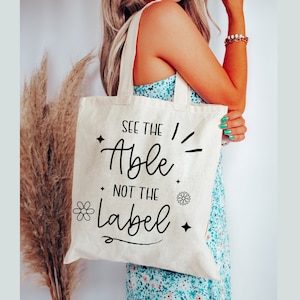 See the Able not the Label Tote bag, Neurodiversity tote, aba therapist bag, special education Cotton Canvas Tote Bag