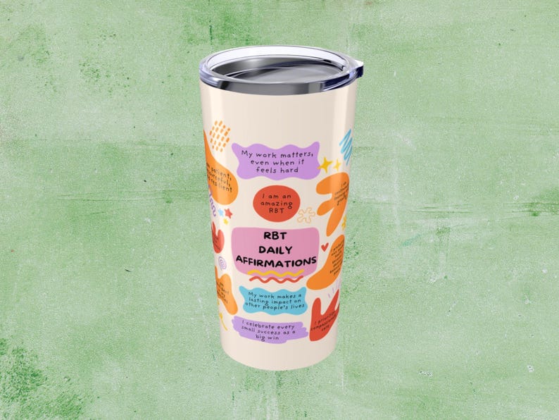 May include: A white stainless steel tumbler with a colorful design featuring affirmations for Registered Behavior Technicians (RBTs). The text reads "My work matters even when it feels hard. I am an amazing RBT. RBT Daily Affirmations."