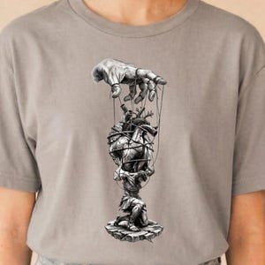 May include: A white ceramic mug with a black handle and the text "But First, Coffee" in a handwritten style. The mug is on a white surface. The mug is likely for hot beverages.