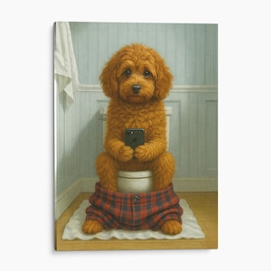 May include: A fluffy golden-brown dog sitting on a white toilet, holding a black smartphone. The dog is wearing red and navy blue plaid trousers pulled down around its ankles. The scene is set against light blue vertical paneled walls.
