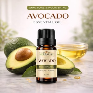 Può includere: Una bottiglia di vetro marrone di olio essenziale di avocado con un tappo nero, etichettata "Herbalist Avocado Essential Oil". L'immagine include un avocado intero e un avocado a fette, insieme a una piccola ciotola di olio. Il testo recita "100% Pure & Nourishing".