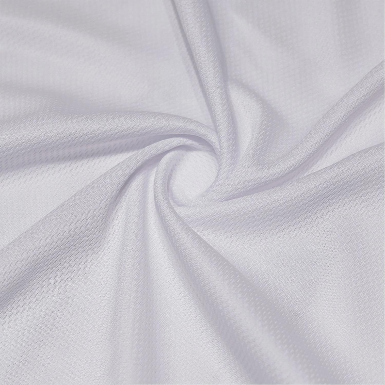 May include: A solid white fabric with a fine, uniform mesh texture. The material is gathered in the center, creating soft, flowing folds and ripples that radiate outward, highlighting the consistent weave and bright, clean white color throughout.