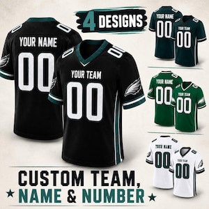 May include: A collection of four custom sports jerseys featuring the text 4 DESIGNS and CUSTOM TEAM, NAME & NUMBER. The jerseys are displayed in black, dark green, and white colourways, each with a V-neck, short sleeves, and eagle wing graphics.