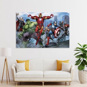 May include: A canvas print featuring a group of superheroes, including Iron Man, Hulk, Captain America, and Thor, against a cityscape backdrop. The artwork showcases vibrant colors and dynamic poses, with lightning effects in the background.