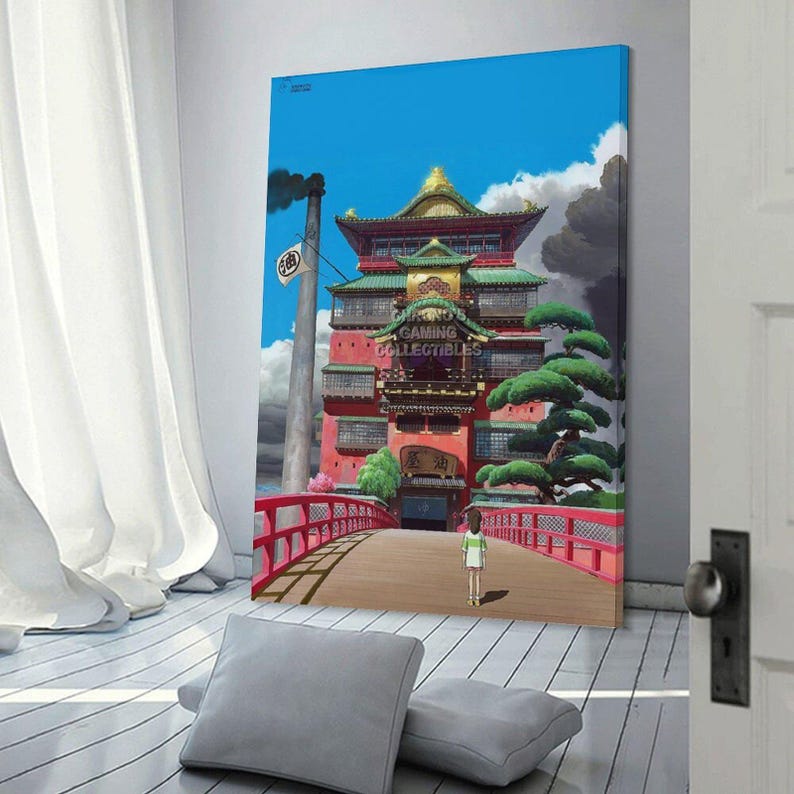 May include: A framed canvas print featuring a vibrant illustration of a Japanese-style building with a red bridge, set against a blue sky with clouds. The print includes the text "GAMING COLLECTIBLES".