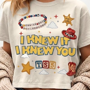 Retro Toy Story 5 inspired PNG design with I Knew It I Knew You text, western cowgirl boots, friendship bracelet, stars, clouds, and toy blocks.
Toy Story 5 birthday shirt design featuring yellow blue retro text, western cowgirl boots, bracelet beads, cowboy hat, badge, clouds, and stars.
I Knew It I Knew You western shirt graphic with Toy Story 5 style, red cowgirl boots, friendship bracelet, playful stars, and colorful toy blocks.