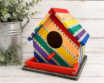 Colorful rainbow hand painted birdhouse