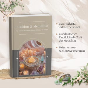May include: A book titled "Intuition & Medialität" with text in German. The cover features a beige and gray design with an arched image of candles and crystals. Additional text on the cover reads "Die Kunst, die eigene innere Stimme zu hören."