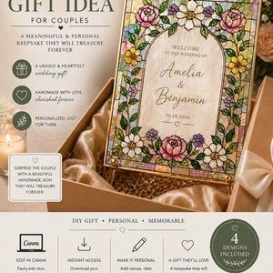 May include: A framed wedding keepsake with a stained-glass effect, featuring floral designs in pink, yellow, and white. The names "Amelia & Benjamin" and the wedding date are displayed. The frame is presented in a gift box, ideal for a wedding gift.