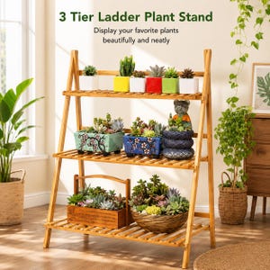 May include: A three-tier wooden ladder plant stand with a slatted design. The top shelf holds six small square pots. The middle shelf features two rectangular planters with floral patterns and a bear figurine. The bottom shelf holds a wooden crate and a basket.