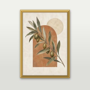 May include: A framed wall art print featuring an olive branch with green olives and elongated leaves centred over a terracotta-coloured arch shape and a pale beige circle, all set against a textured off-white background in a gold frame.