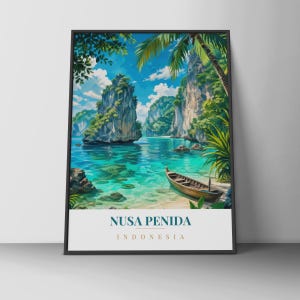 May include: A framed vertical art print featuring a tropical coastal landscape with turquoise water, limestone cliffs, and lush green palm trees. A wooden boat rests on the sandy shore. The text at the bottom reads NUSA PENIDA INDONESIA.