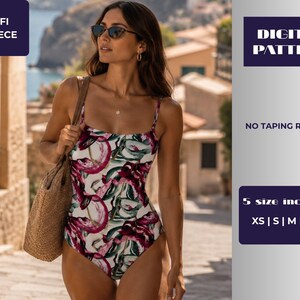 May include: A one-piece swimsuit featuring a white base with abstract magenta and dark green brushstroke patterns. Text on the image reads: AMALFI ONE-PIECE, DIGITAL PATTERN, NO TAPING REQUIRED, 5 size included, XS | S | M | L | XL.