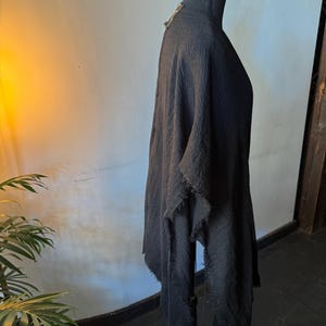 Black   poncho scarf. Uni sex.