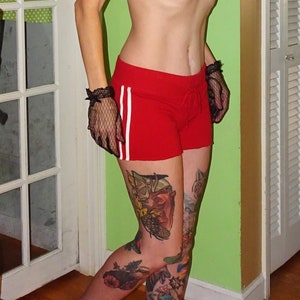 Mens red running sales shorts with white trim
