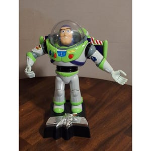 Reloj de sobremesa vintage de Disney Toy Story Buzz Lightyear con sensor de movimiento y luz (FUNCIONA)