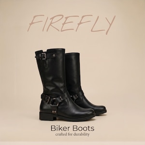 May include: A pair of black mid-calf biker boots featuring a buckle strap at the ankle and a smaller buckle strap at the top. The text FIREFLY is displayed above the boots, and the text Biker Boots crafted for durability is below them.