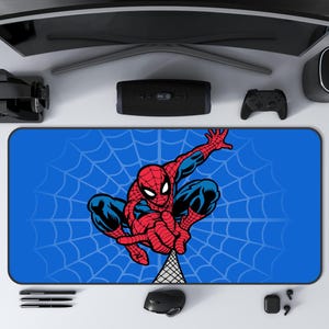 May include: A set of three ceramic mugs with a speckled, matte finish. The mugs are in shades of cream, light gray, and dark gray. Each mug has a simple, minimalist design, perfect for coffee or tea.