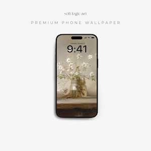 May include: A smartphone shows a floral wallpaper featuring white flowers in a glass jar. The screen displays the time as 9:41 AM on Tuesday, January 9. The words "soft logic art" and "PREMIUM PHONE WALLPAPER" are above the phone.