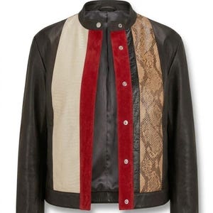 May include: A black jacket featuring a mandarin collar and a front button closure. The front panels display a multi-textured design with vertical sections of cream-colored embossed leather, red suede, black leather, and a brown snakeskin print.