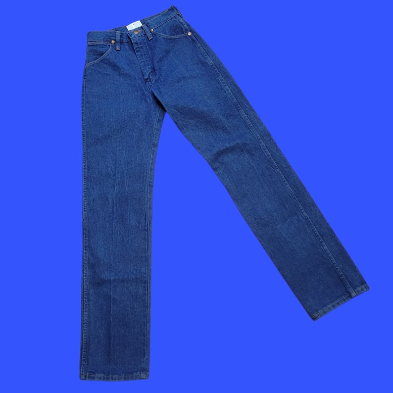 May include: A pair of blue denim jeans with a classic straight leg fit.