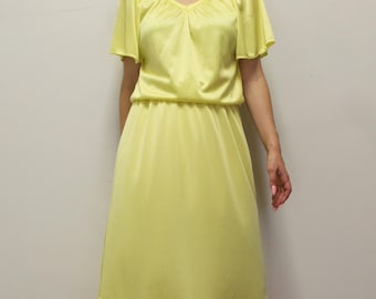 Minivestido amarillo estilo disco vintage de los años 70