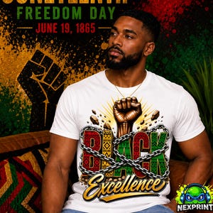 May include: A white t-shirt featuring a graphic of a raised fist breaking through chains. The word BLACK is printed in red, yellow, and green with patterned textures, and the word Excellence is written below in gold script lettering.