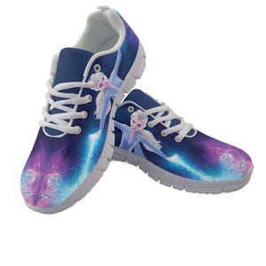 May include: Pair of blue athletic shoes featuring a cartoon character design. The shoes have white laces, a white interior, and a gray sole. The design includes a character in a blue dress with a purple and blue background.