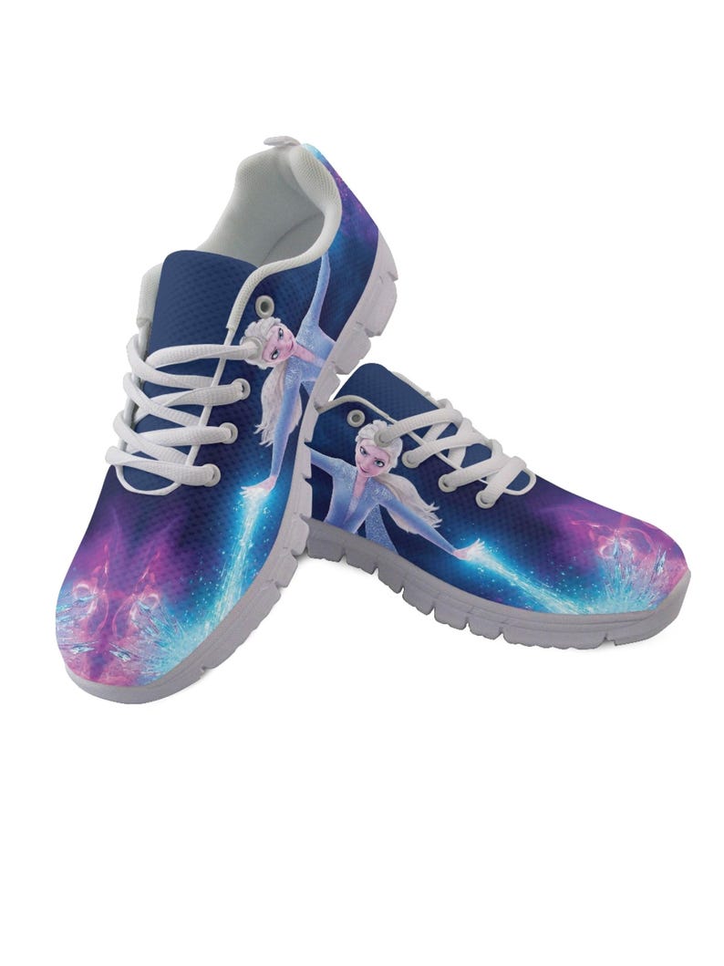 May include: Pair of blue athletic shoes featuring a cartoon character design. The shoes have white laces, a white interior, and a gray sole. The design includes a character in a blue dress with a purple and blue background.
