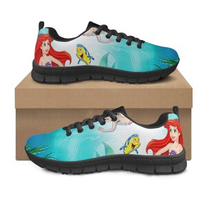 May include: A set of three ceramic mugs with a speckled, matte finish. Each mug is a different colour: light blue, cream, and grey. The mugs have a simple, modern design, ideal for coffee or tea.