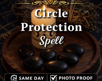 May include: A cream-colored pillar candle with black celestial symbols, including moons and stars, sits on a round wooden tray surrounded by six smooth, polished black stones. The text "Circle Protection Spell" is centered above the candle.