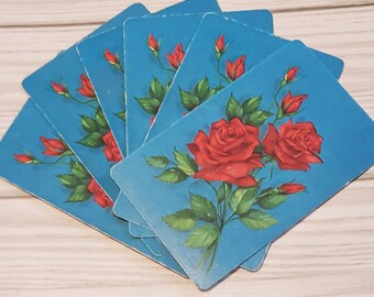 Cartes à jouer roses rouges