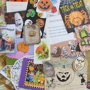 May include: A collage of Halloween-themed ephemera. Includes a "Trick or Treat" bag with a spider, pumpkin-themed illustrations, a "Potion" label, and a vintage "Merry Halloween" card. Various other cards and stickers are also present.