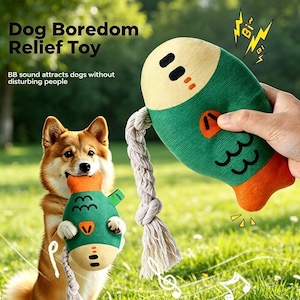 May include: A green and orange fish-shaped dog toy with a rope attached. The toy is held by a person and a dog. The image includes the text "Dog Boredom Relief Toy" and "BB sound attracts dogs without disturbing people."