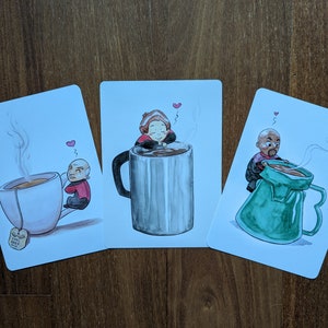 Set aus allen drei Captain Postkarten