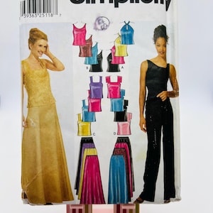 May include: Simplicity sewing pattern featuring various women's tops and skirts. The pattern includes illustrations of different styles, with a focus on tank tops and flowing skirts. The package has a white background with the Simplicity logo.