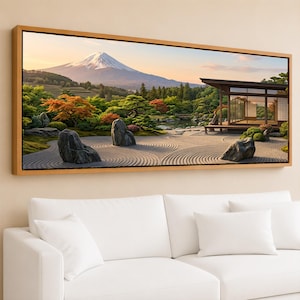 May include: A framed landscape print of a Japanese garden with Mount Fuji in the background. The artwork features a zen garden with raked sand, large rocks, and a traditional wooden structure. The color palette includes greens, browns, and blues, creating a serene atmosphere.